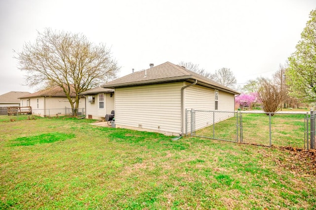 919 S Central Ave, Marionville, MO 65705 - back of house featuring a gate, fence, roof with shingles, and a yard