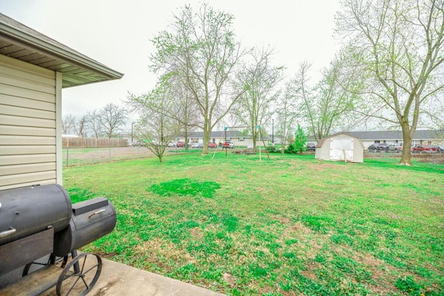 919 S Central Ave, Marionville, MO 65705 - view of yard featuring an outbuilding, fence, and a shed