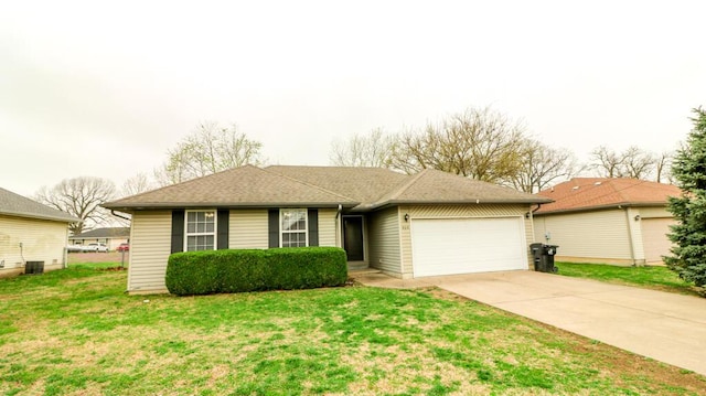 919 S Central Ave, Marionville, MO 65705 - ranch-style home with driveway, a front yard, an attached garage, and roof with shingles