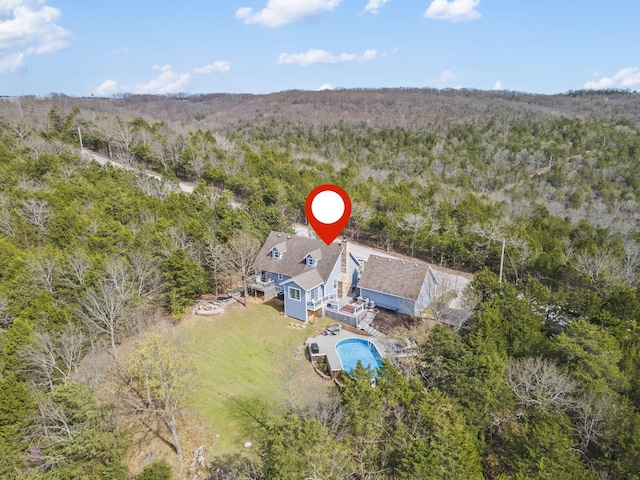 aerial view with a wooded view