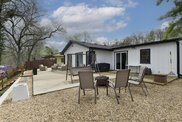 1428 Acacia Club Rd, Hollister, MO 65672 - back of house featuring a patio area, fence, and an outdoor living space with a fire pit