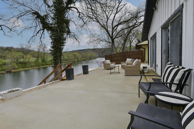 1428 Acacia Club Rd, Hollister, MO 65672 - view of patio / terrace featuring a water view and fence