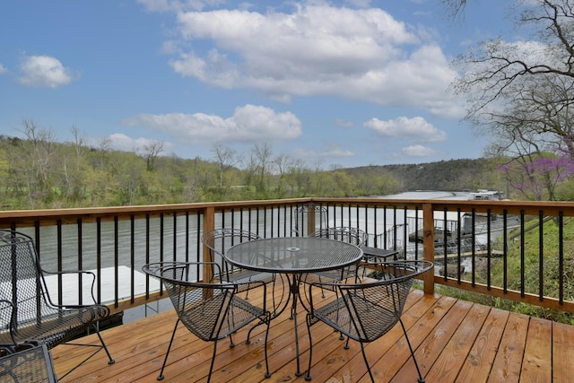 1428 Acacia Club Rd, Hollister, MO 65672 - deck with outdoor dining space and a forest view