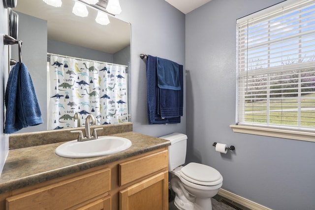 32 Homewood Ln, Kimberling City, MO 65686 - bathroom with vanity, toilet, baseboards, curtained shower, and visible vents