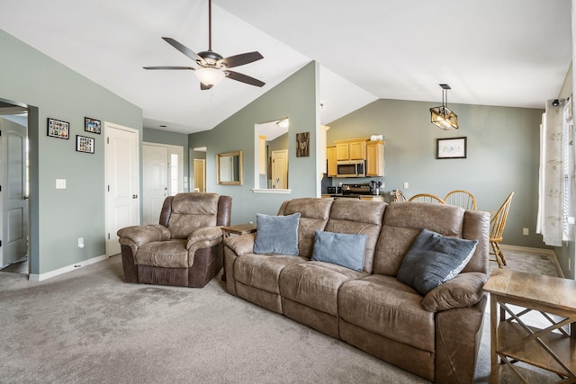 32 Homewood Ln, Kimberling City, MO 65686 - living area featuring baseboards, a ceiling fan, vaulted ceiling, and carpet flooring