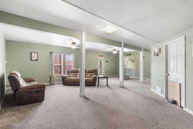 32 Homewood Ln, Kimberling City, MO 65686 - living room featuring carpet flooring, a ceiling fan, baseboards, and visible vents