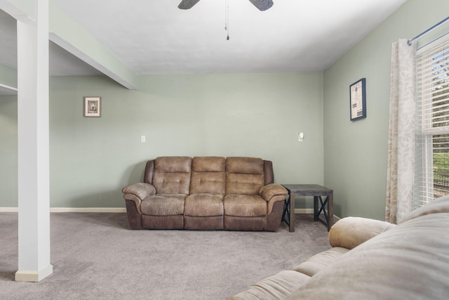 32 Homewood Ln, Kimberling City, MO 65686 - living area featuring a healthy amount of sunlight, carpet floors, ceiling fan, and baseboards