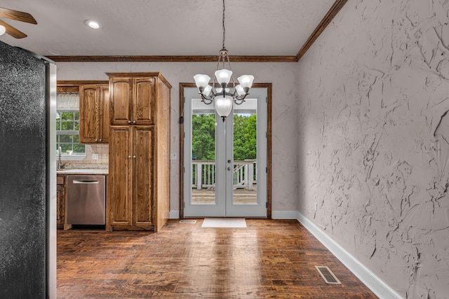 3607 Quail Run Rd, West Plains, MO 65775 - unfurnished dining area featuring ornamental molding, dark wood-style floors, a chandelier, a ceiling fan, and french doors