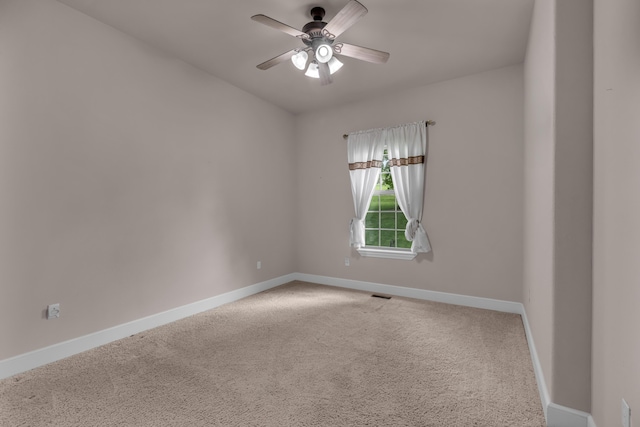 3607 Quail Run Rd, West Plains, MO 65775 - spare room featuring carpet floors, baseboards, and a ceiling fan