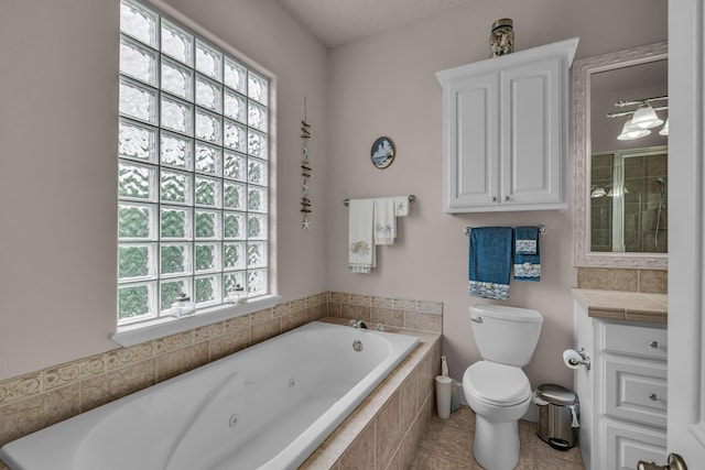 3607 Quail Run Rd, West Plains, MO 65775 - bathroom featuring healthy amount of natural light, toilet, a whirlpool tub, and vanity