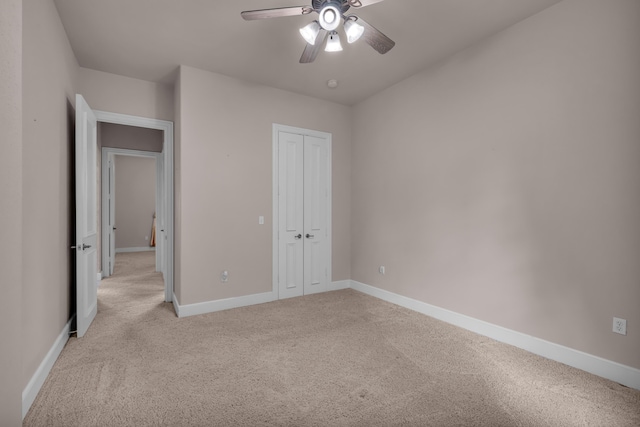 3607 Quail Run Rd, West Plains, MO 65775 - unfurnished bedroom featuring light colored carpet, baseboards, a closet, and a ceiling fan