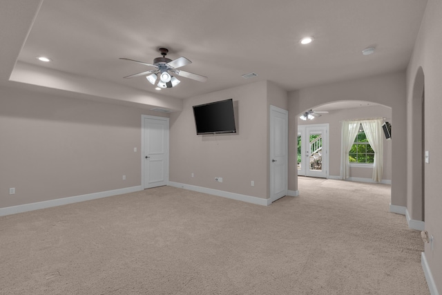 3607 Quail Run Rd, West Plains, MO 65775 - unfurnished living room featuring ceiling fan, arched walkways, light colored carpet, baseboards, and recessed lighting