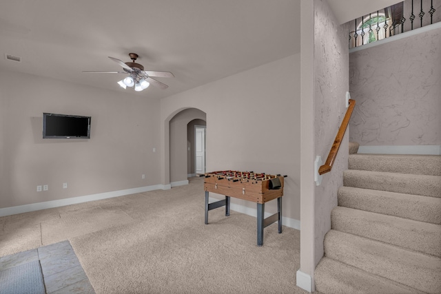 3607 Quail Run Rd, West Plains, MO 65775 - rec room featuring arched walkways, ceiling fan, and baseboards