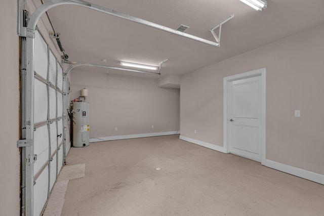 3607 Quail Run Rd, West Plains, MO 65775 - garage with water heater and baseboards
