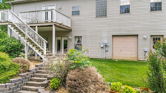 3607 Quail Run Rd, West Plains, MO 65775 - back of house with stairs, a deck, and a yard