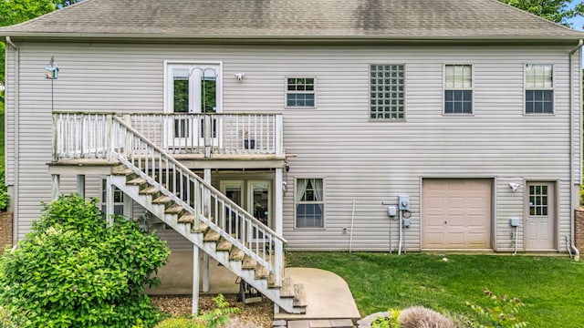 3607 Quail Run Rd, West Plains, MO 65775 - back of property featuring stairway, a deck, a yard, and a shingled roof