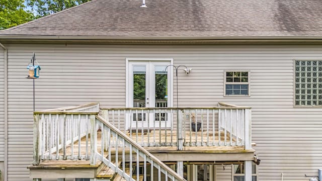 3607 Quail Run Rd, West Plains, MO 65775 - rear view of property featuring roof with shingles, a wooden deck, and french doors