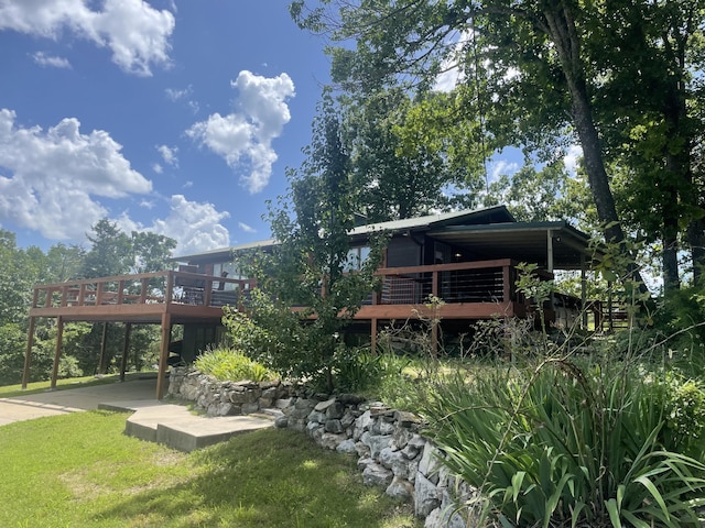 6 Evergreen Dr, Kimberling City, MO 65686 - back of house with a deck and a yard