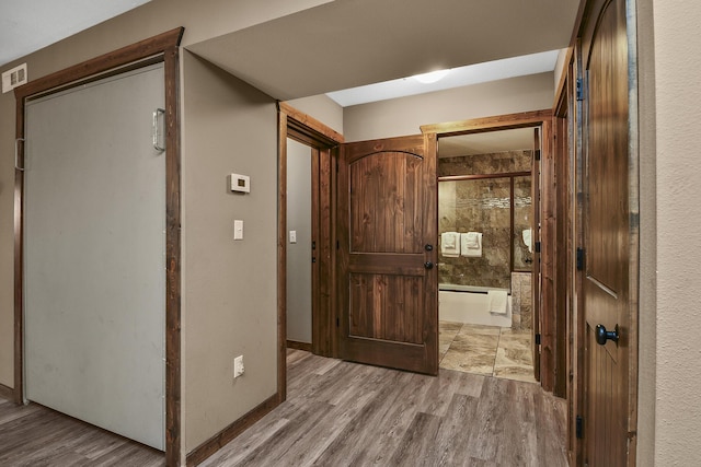 164 Dogwood Park Trl Bldg 1204, Branson, MO 65616 - hallway featuring baseboards, visible vents, and wood finished floors