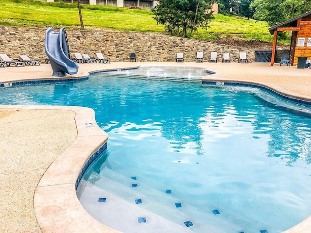 164 Dogwood Park Trl Bldg 1204, Branson, MO 65616 - community pool with a water slide and a patio