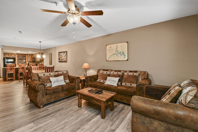 164 Dogwood Park Trl Bldg 1204, Branson, MO 65616 - living room featuring ceiling fan with notable chandelier and light wood-style floors