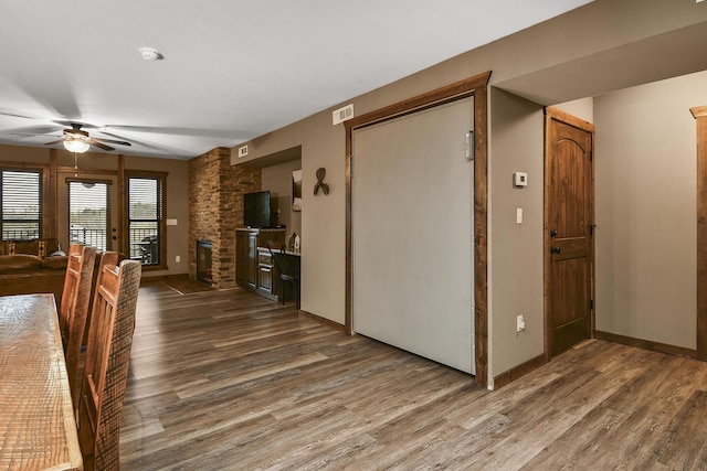 164 Dogwood Park Trl Bldg 1204, Branson, MO 65616 - unfurnished dining area with baseboards, visible vents, ceiling fan, and wood finished floors