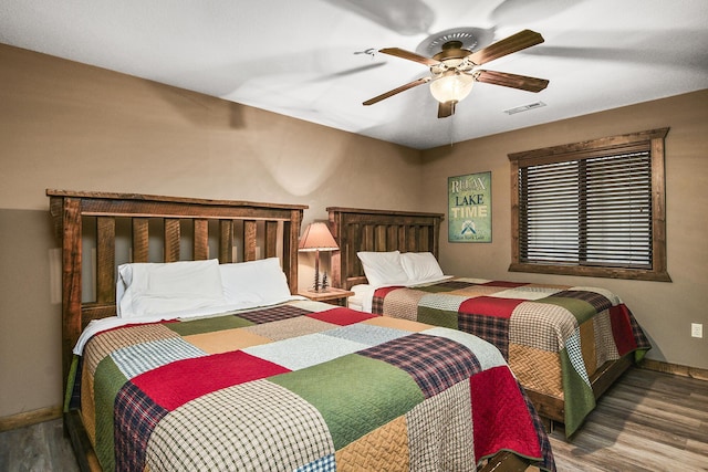 164 Dogwood Park Trl Bldg 1204, Branson, MO 65616 - bedroom featuring baseboards, visible vents, wood finished floors, and a ceiling fan