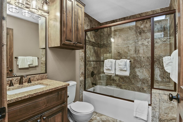 164 Dogwood Park Trl Bldg 1204, Branson, MO 65616 - bathroom with toilet, shower / bath combination with glass door, and vanity