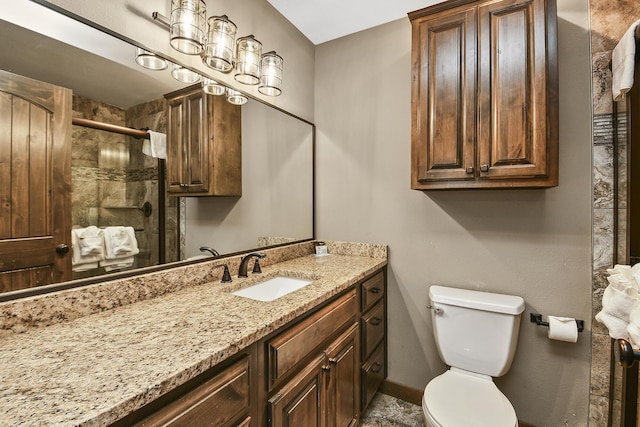 164 Dogwood Park Trl Bldg 1204, Branson, MO 65616 - bathroom featuring baseboards, toilet, a tile shower, and vanity