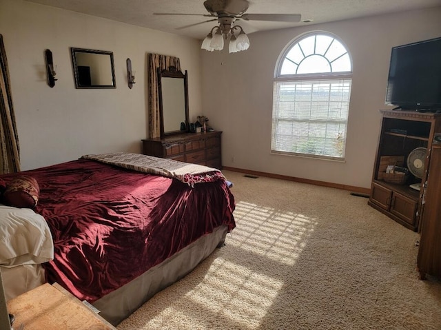 7 Lawrence Unit 2200, Wentworth, MO 64873 - bedroom featuring light colored carpet, baseboards, and ceiling fan