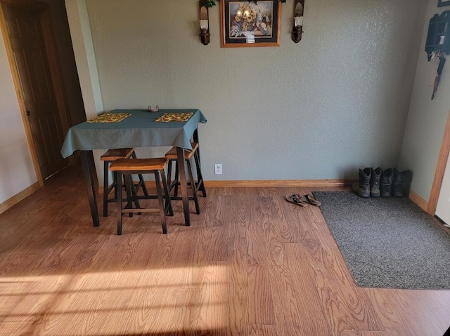 7 Lawrence Unit 2200, Wentworth, MO 64873 - dining space with wood finished floors and baseboards