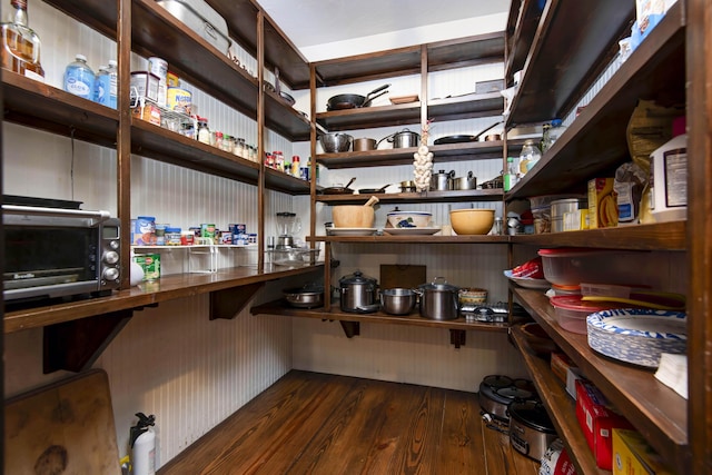 storage area featuring a toaster