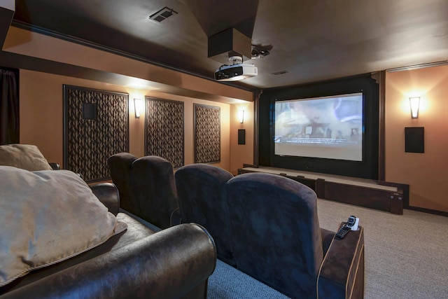 home theater room with visible vents and carpet flooring