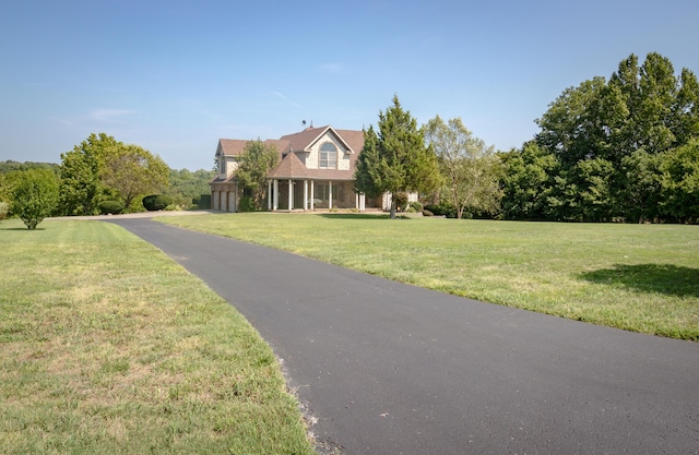 1321 E River Oak Dr, Springfield, MO 65803 - cape cod house featuring a front lawn