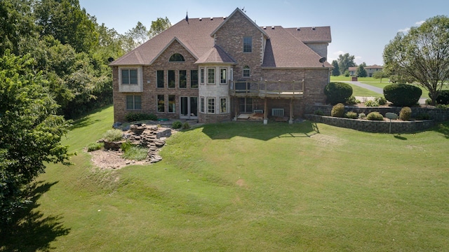 1321 E River Oak Dr, Springfield, MO 65803 - rear view of property with a lawn and brick siding