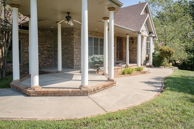 1321 E River Oak Dr, Springfield, MO 65803 - property entrance featuring a ceiling fan, brick siding, a shingled roof, and a patio