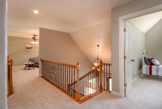 1321 E River Oak Dr, Springfield, MO 65803 - corridor featuring baseboards, vaulted ceiling, an upstairs landing, and carpet