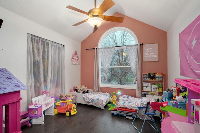 bedroom with wood finished floors, ceiling fan, and vaulted ceiling