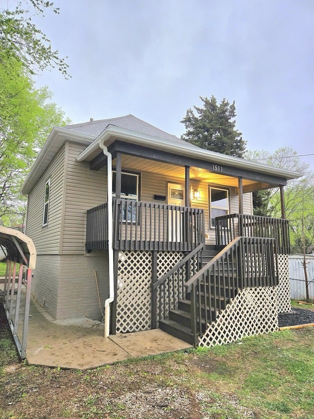 1511 W Lee St, Springfield, MO 65803 - exterior space featuring a porch and stairs