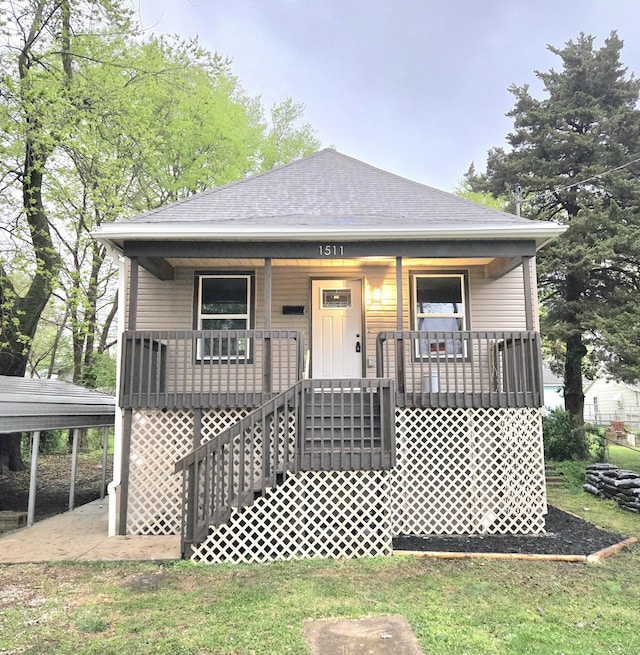 1511 W Lee St, Springfield, MO 65803 - view of front facade with a porch and a shingled roof