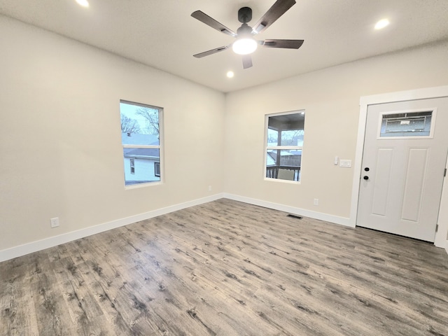 1511 W Lee St, Springfield, MO 65803 - interior space with a healthy amount of sunlight, wood finished floors, and ceiling fan