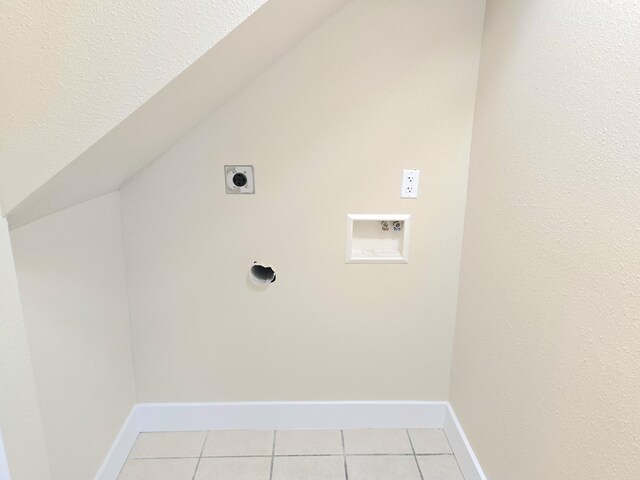 1511 W Lee St, Springfield, MO 65803 - laundry area with light tile patterned flooring, hookup for an electric dryer, washer hookup, and baseboards