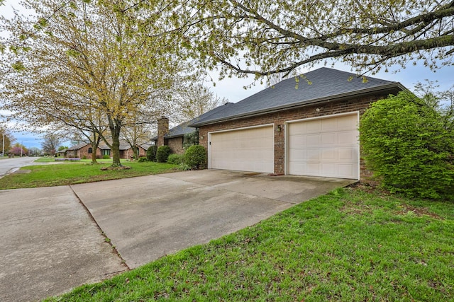 3740 W Glenwood Ct, Springfield, MO 65807 - view of side of home featuring a shingled roof, a lawn, a garage, brick siding, and driveway