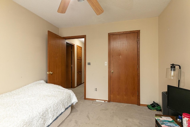 3740 W Glenwood Ct, Springfield, MO 65807 - bedroom featuring a closet, light colored carpet, baseboards, and a ceiling fan
