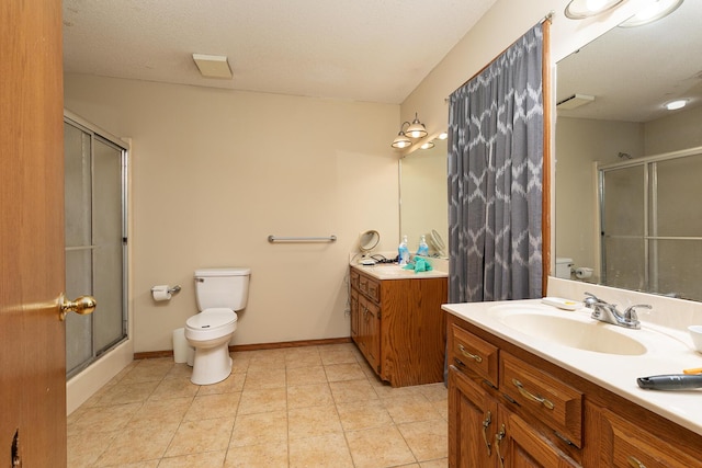 3740 W Glenwood Ct, Springfield, MO 65807 - bathroom with a sink, toilet, and a shower stall