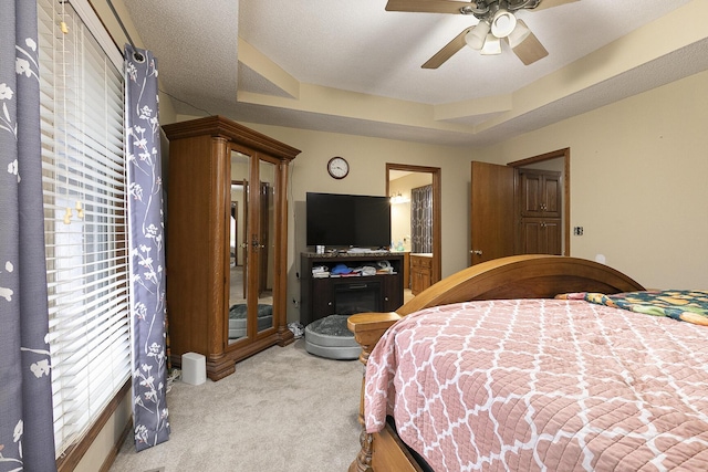 3740 W Glenwood Ct, Springfield, MO 65807 - bedroom featuring ceiling fan, a raised ceiling, and light carpet