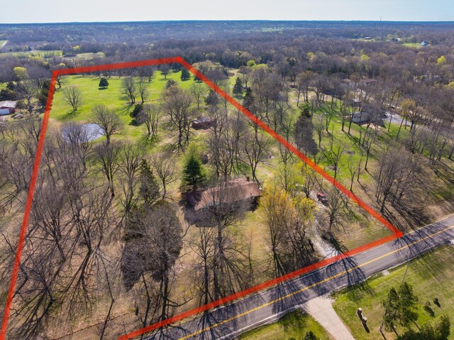 drone / aerial view with a forest view
