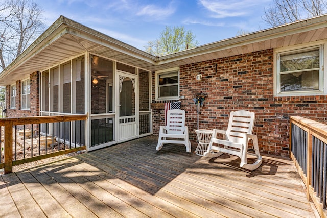 wooden terrace with a sunroom