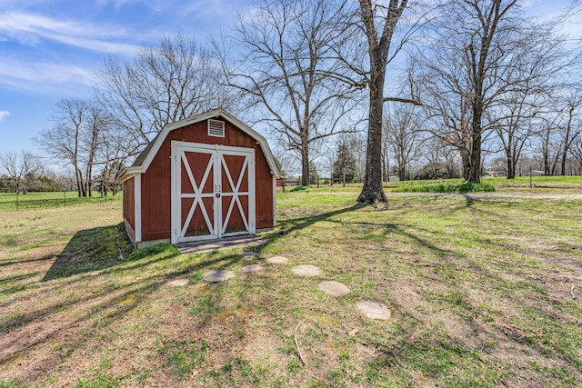 view of shed with a rural view