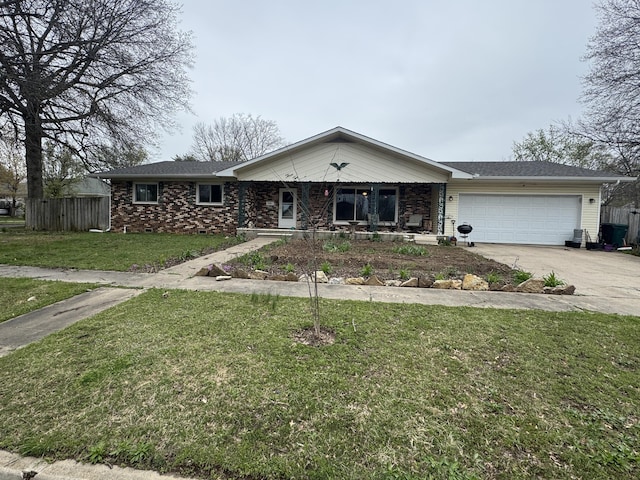 310 W Wishart Dr, Monett, MO 65708 - ranch-style house with driveway, a garage, and covered porch